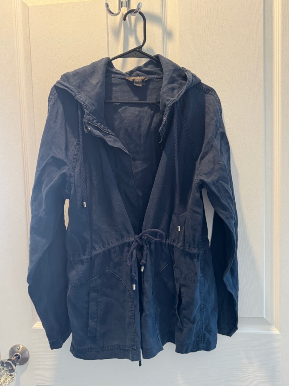 Women's Tommy Bahama lightweight linen navy jacket and mid-calf pants set.